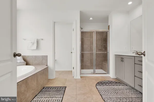 a living room with a rug and a rug