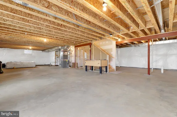 a view of a room with wooden walls
