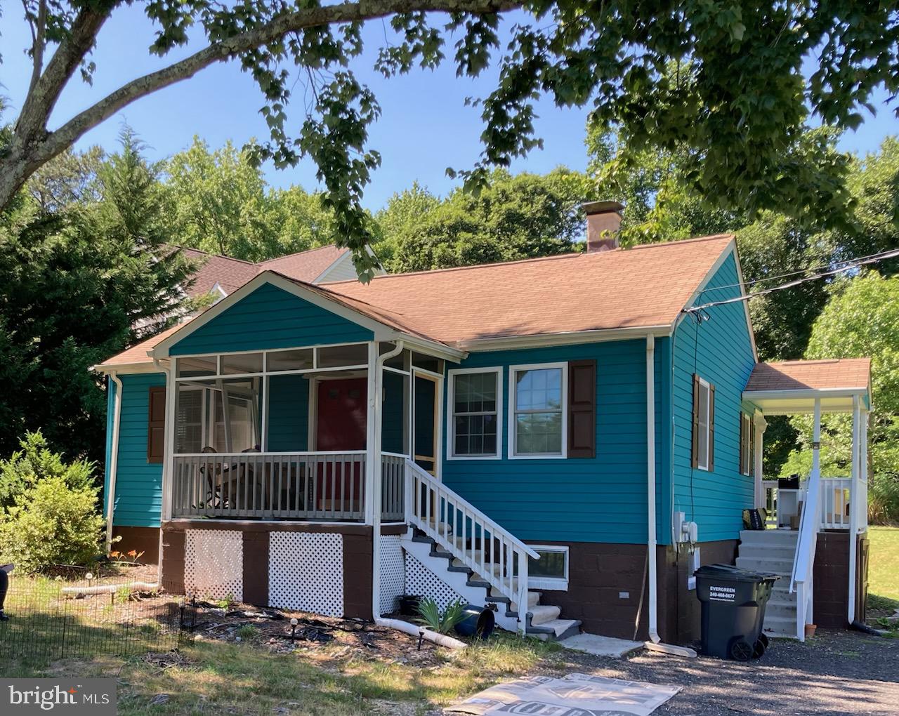 aerial view of a house with a yard
