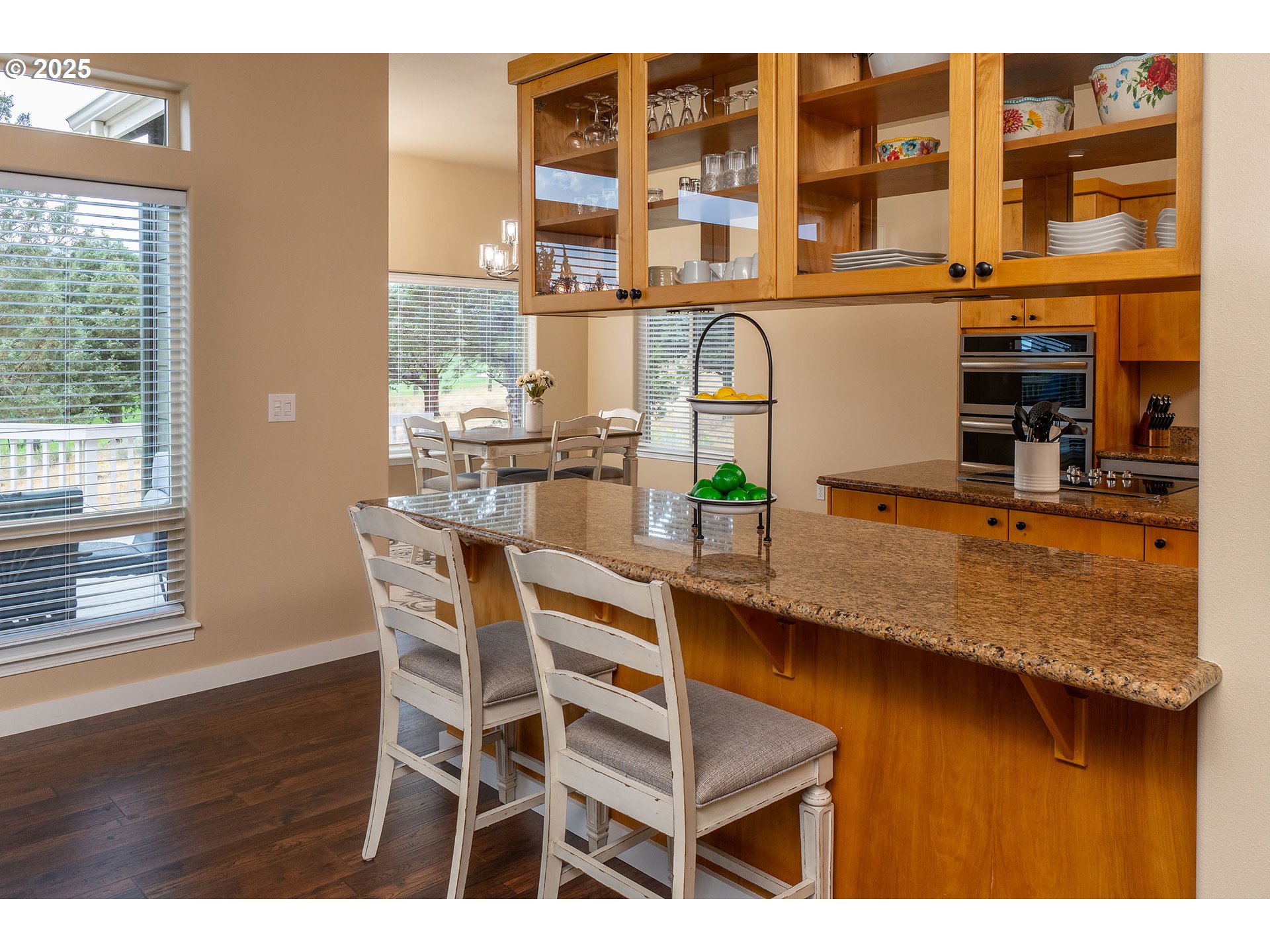 7986 Little Falls Court Redmond, OR 97756 - Photo 12 of 32 a view of a dining room with furniture and window