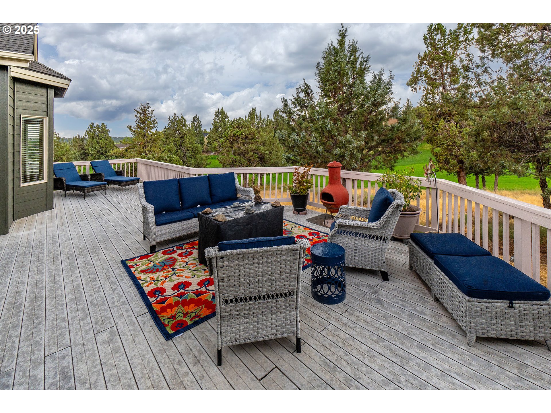 7986 Little Falls Court Redmond, OR 97756 - Photo 22 of 32 a outdoor living space with furniture and city view