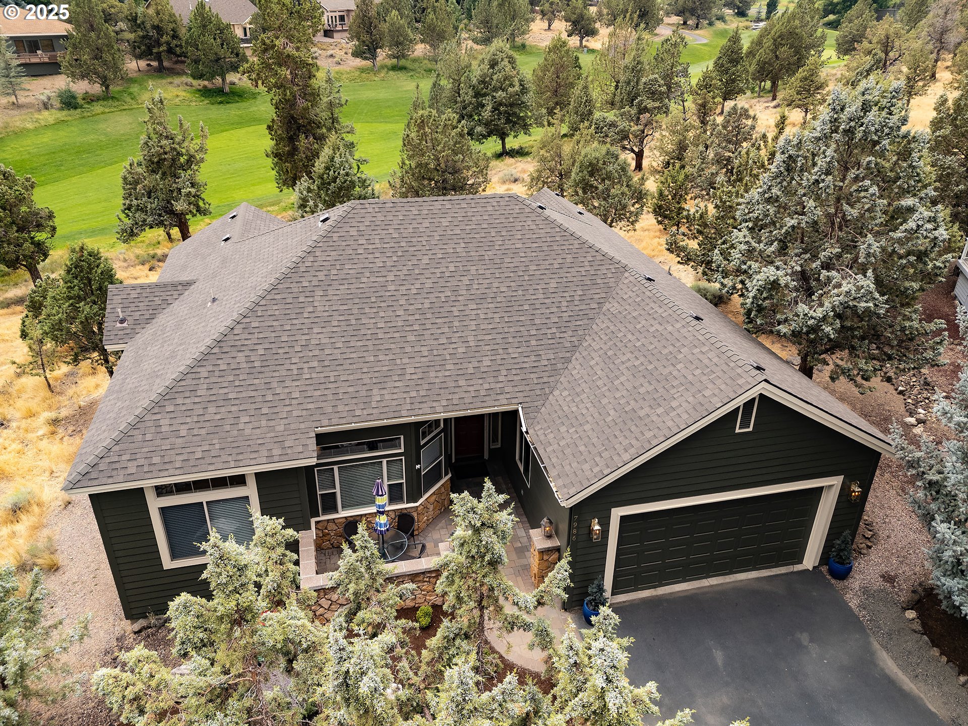 7986 Little Falls Court Redmond, OR 97756 - Photo 24 of 32 a house view with a garden space