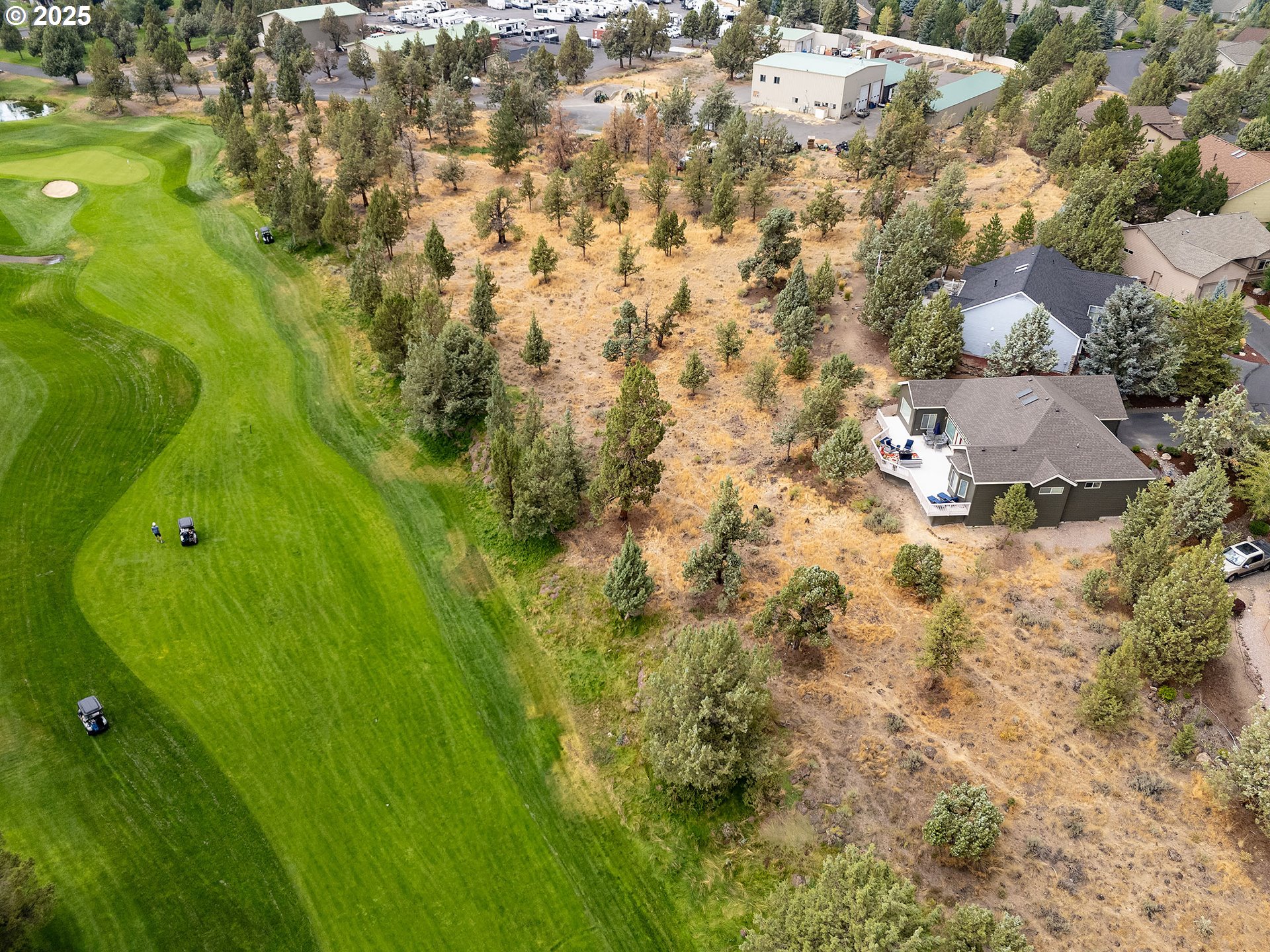 7986 Little Falls Court Redmond, OR 97756 - Photo 31 of 32 a aerial view of residential houses with yard