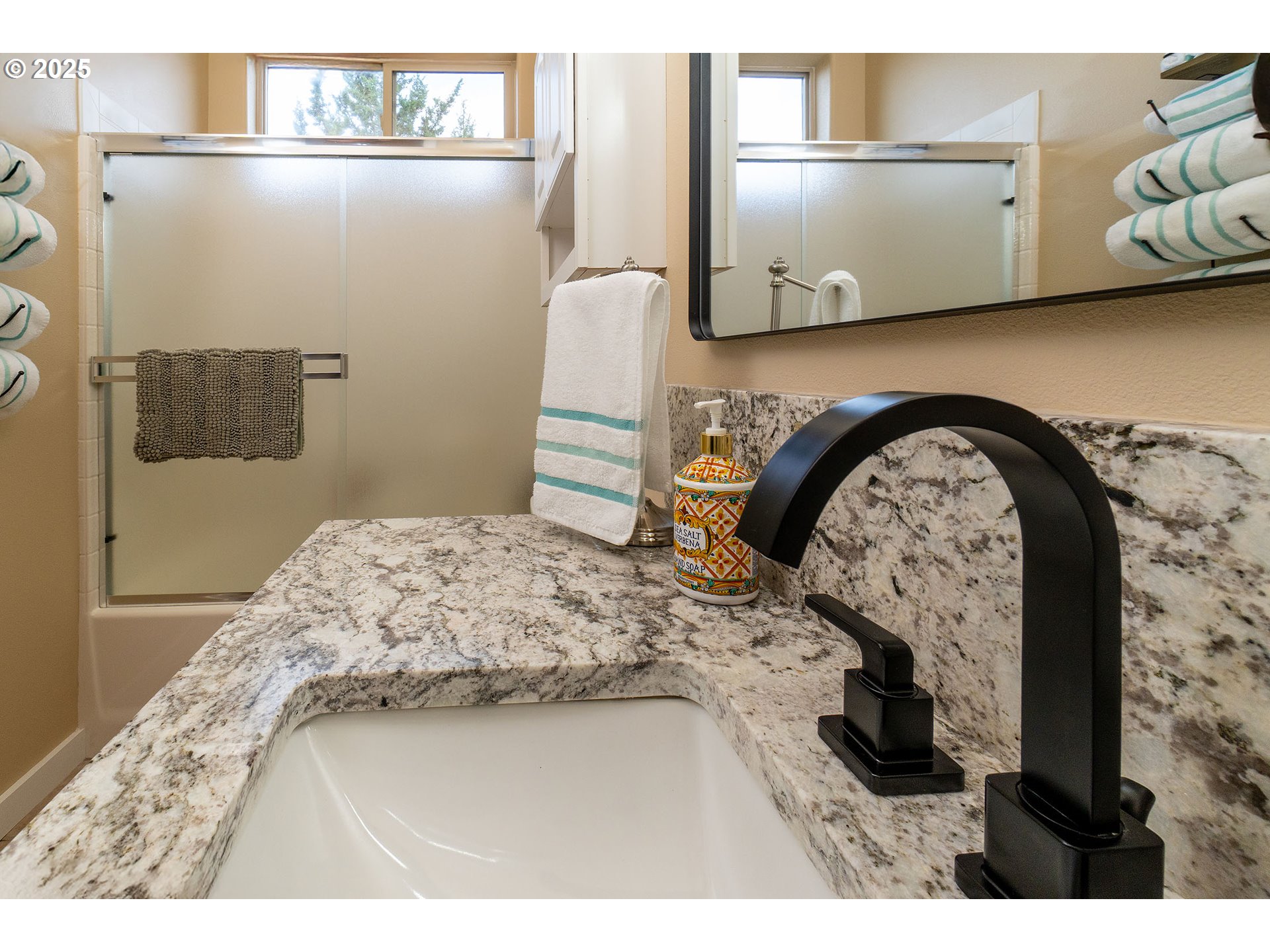 7986 Little Falls Court Redmond, OR 97756 - Photo 9 of 32 a bedroom with a bed and a dresser