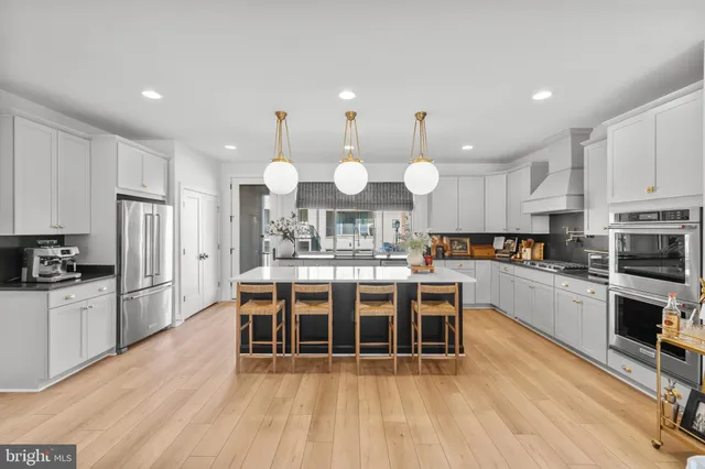 a living room with fireplace furniture and a flat screen tv