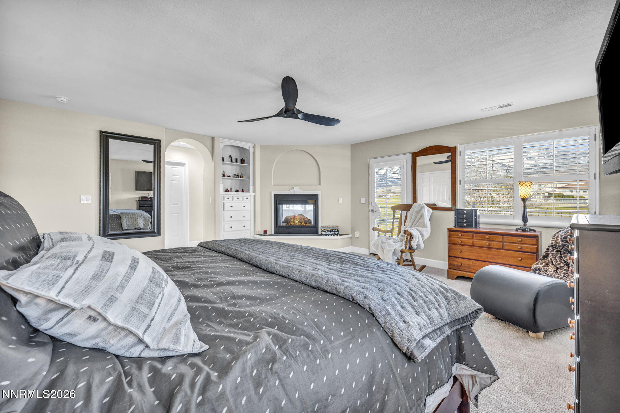 2296 Oak Ridge Drive Carson City, NV 89703 - Photo 36 of 72 a spacious bedroom with a bed and glass windows