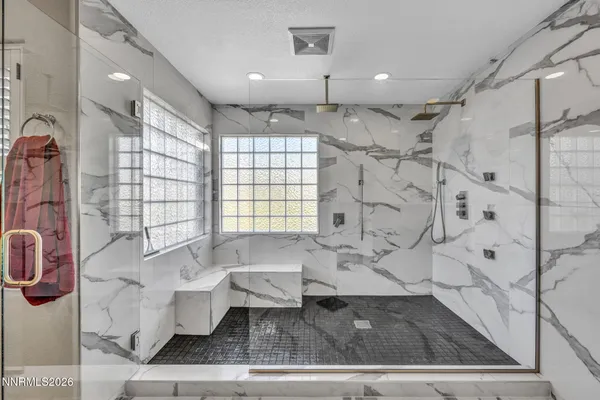 a view of a roof deck with wooden floor and fence