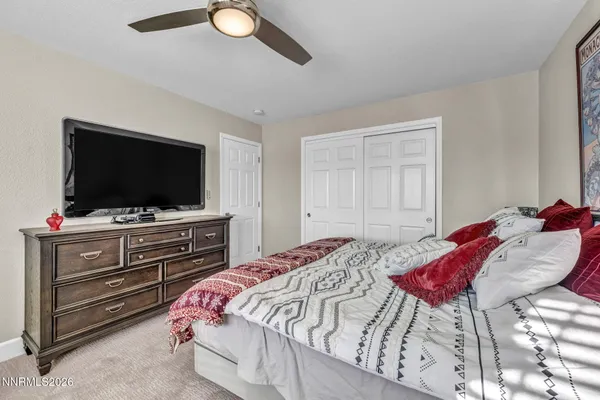 a front view of a house with trees