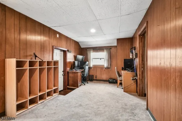 a room with furniture and a walk in closet