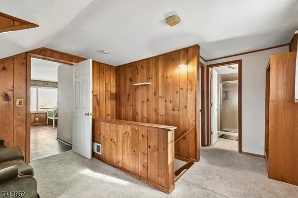a view of a hallway with closet area