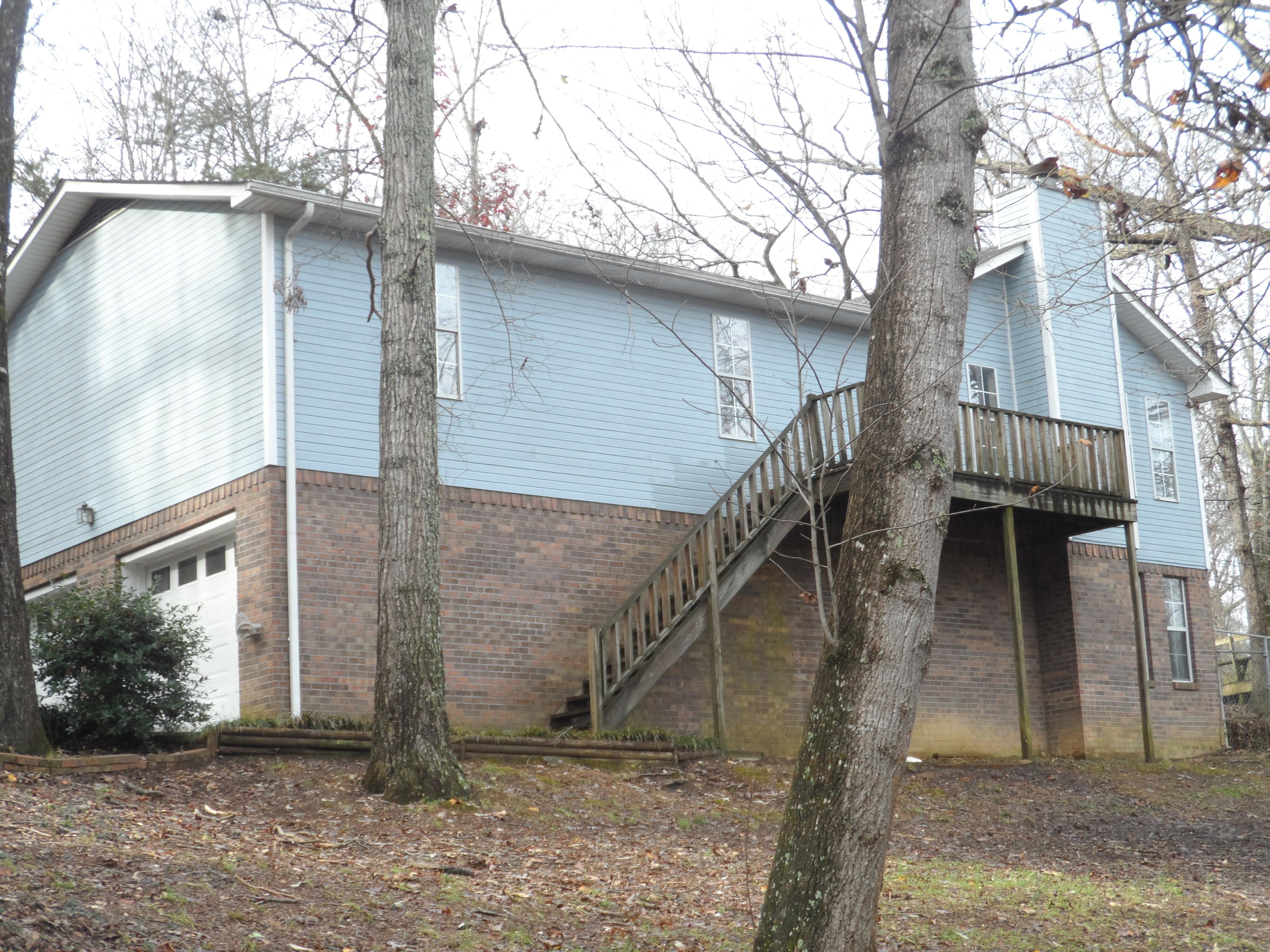 8821 Hidden Branches Road Harrison, TN 37341 - Photo 1 of 24 Front of home