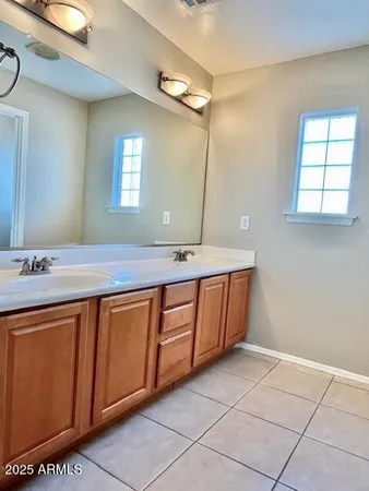 a bathroom with a shower and a bath tub