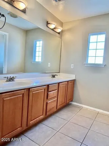 a bathroom with a shower and a bath tub