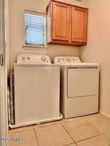 a view of swimming pool with a bench in patio