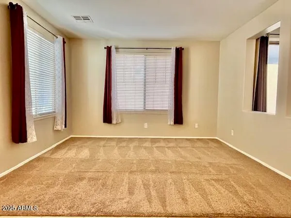 a view of a living room with a large window