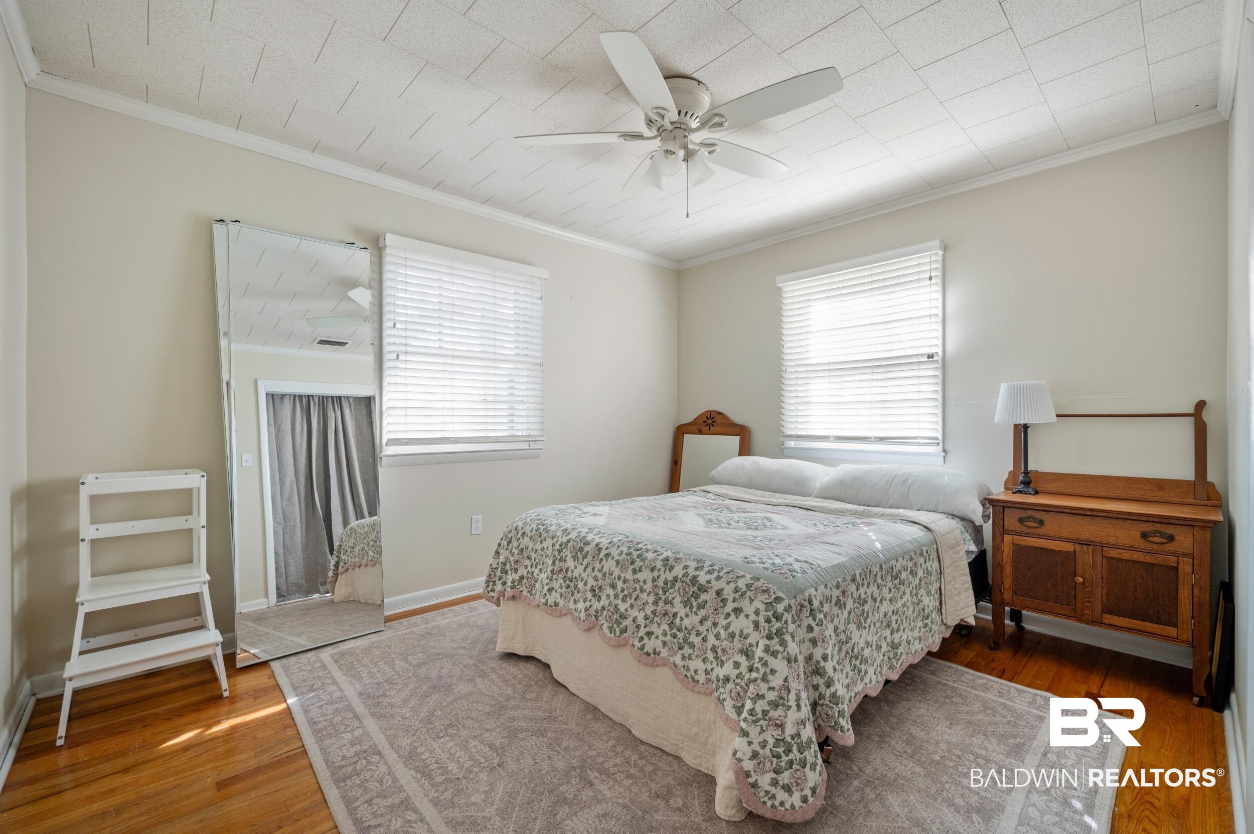 809 Moog Avenue Bay Minette, AL 36507 - Photo 21 of 33 Bedroom with wood finished floors, ornamental molding, and ceiling fan