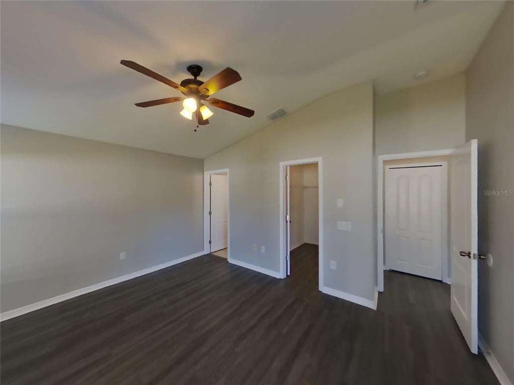 Undisclosed Address Land O Lakes, FL 34639 - Photo 6 of 15 a view of empty room with wooden floor