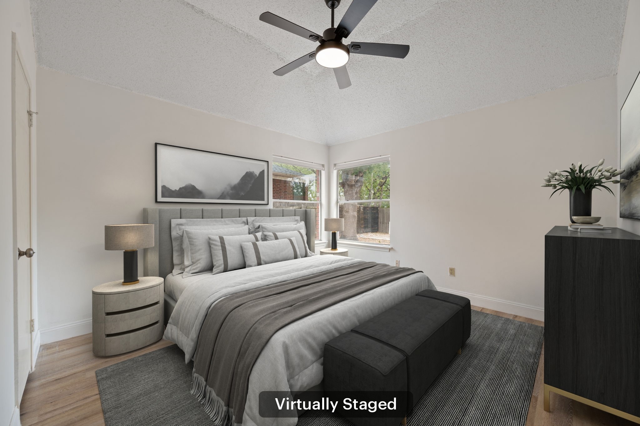 12501 Fallen Tower Lane Austin, TX 78753 - Photo 18 of 31 a bedroom with a bed and a flat screen tv