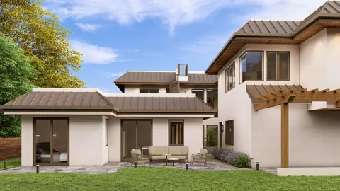 a view of a house with backyard and porch