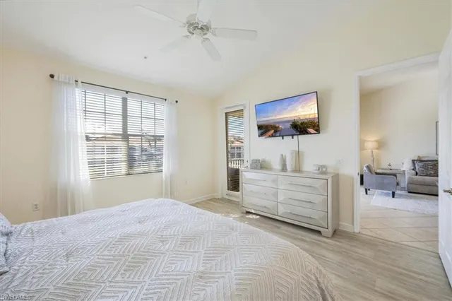 a bedroom with furniture and window