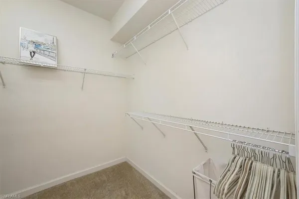 a view of a room with racks on the wall