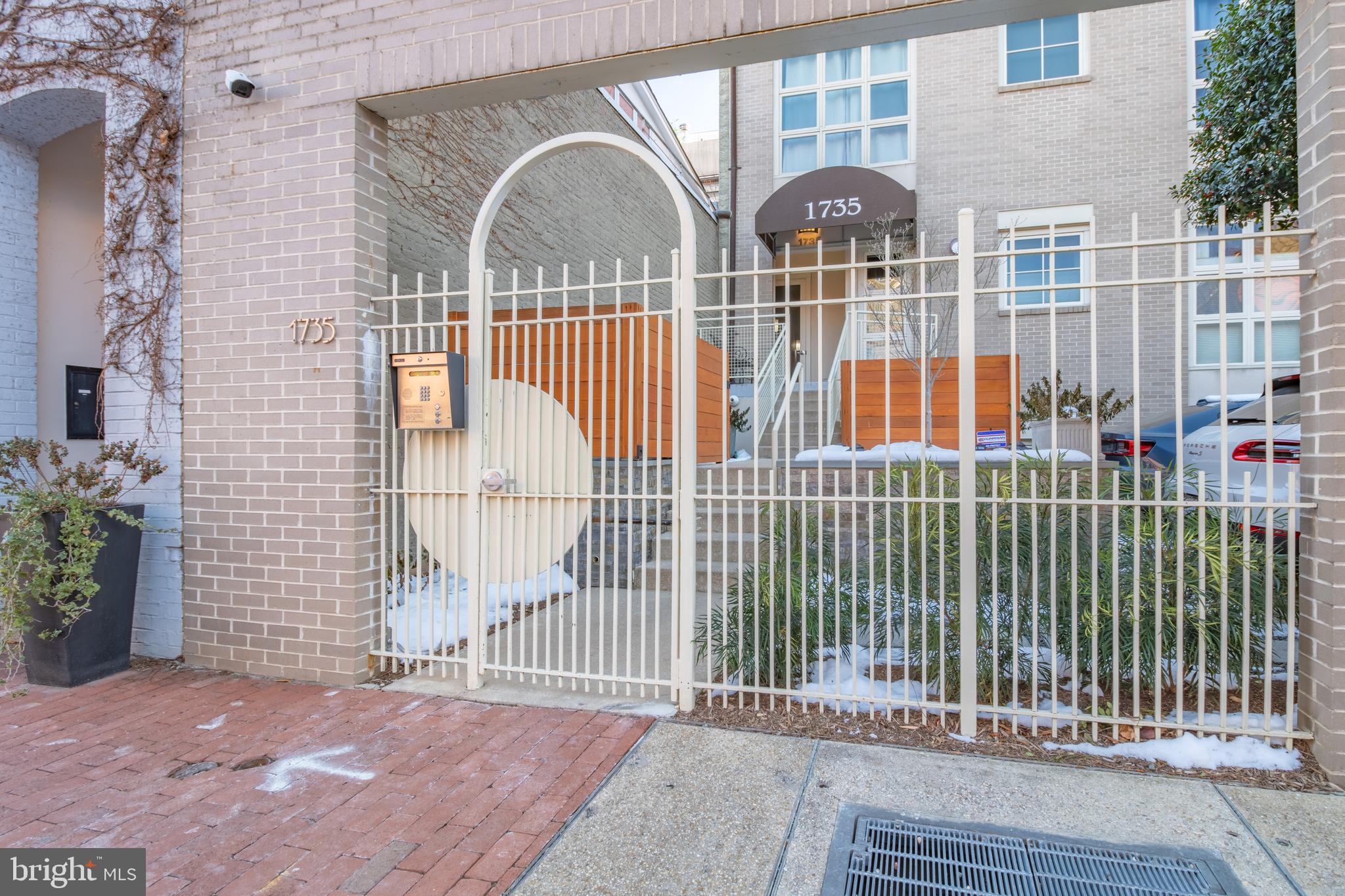 1735 Johnson Avenue Northwest, Unit B Washington, DC 20009 - Photo 2 of 34 a view of a balcony with two iron gate