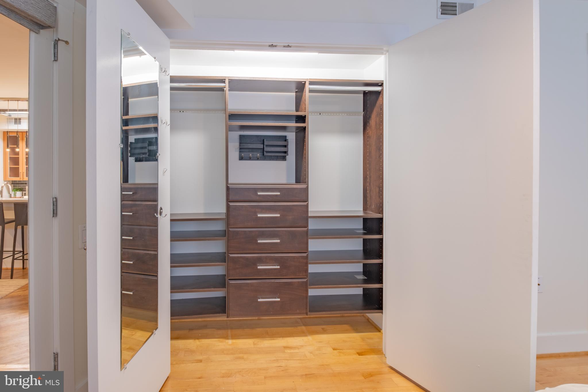 1735 Johnson Avenue Northwest, Unit B Washington, DC 20009 - Photo 31 of 34 a view of walk in closet with clothes