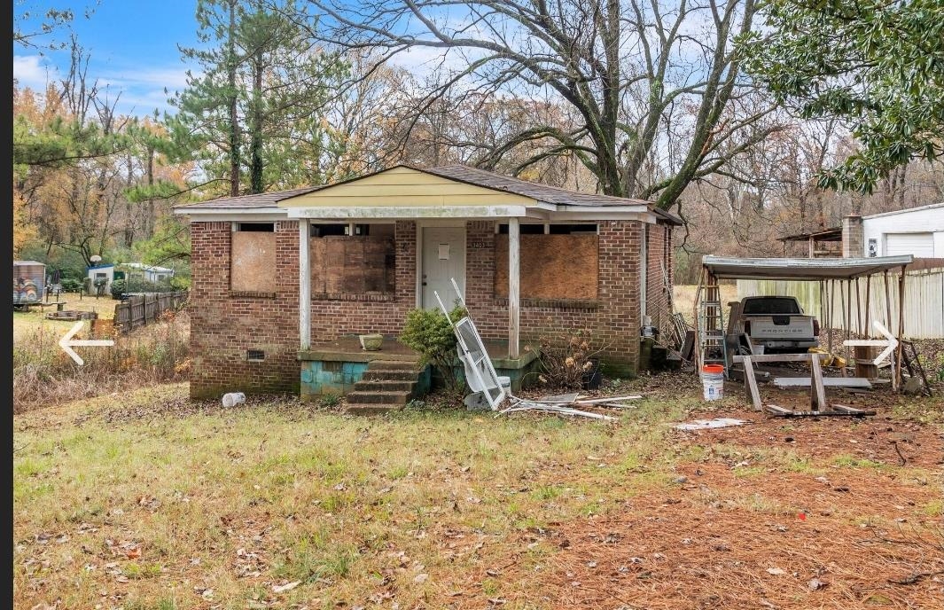 3403 Dillard Road Memphis, TN 38128 - Photo 1 of 17 a view of a house with backyard