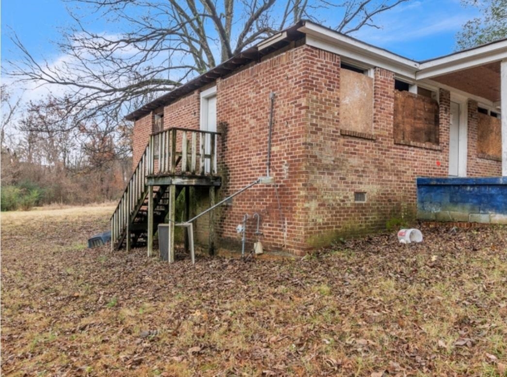 3403 Dillard Road Memphis, TN 38128 - Photo 2 of 17 a view of a house with a yard