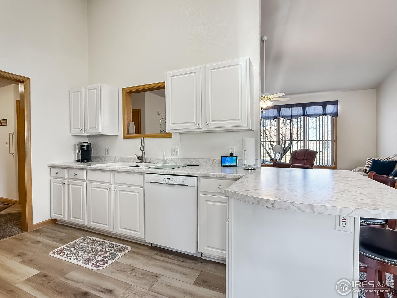 817 Mindy Circle, Unit B Sterling, CO 80751 - Photo 13 of 34 a kitchen with stainless steel appliances granite countertop a sink stove and cabinets