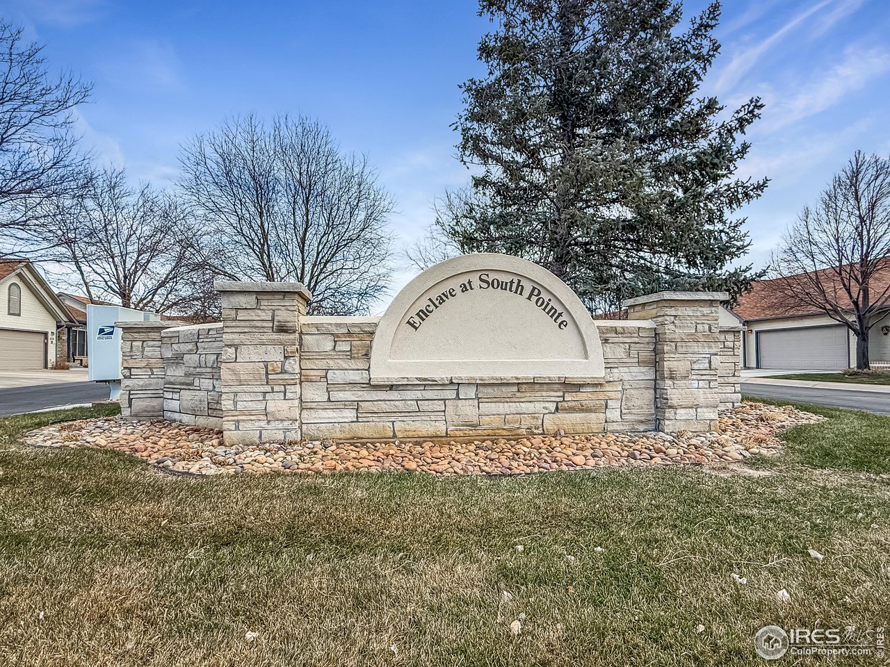 817 Mindy Circle, Unit B Sterling, CO 80751 - Photo 2 of 34 a view of a wooden house with a yard