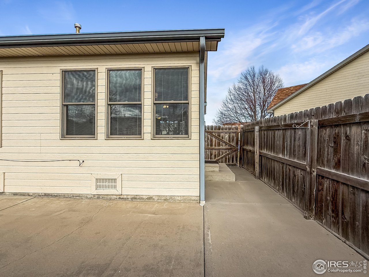 817 Mindy Circle, Unit B Sterling, CO 80751 - Photo 27 of 34 a view of entrance gate of a house