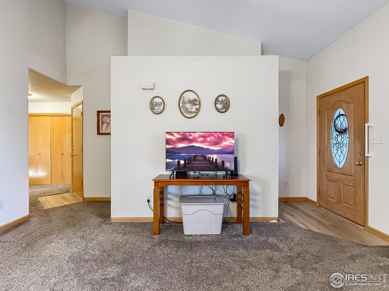 817 Mindy Circle, Unit B Sterling, CO 80751 - Photo 5 of 34 a room with furniture and table