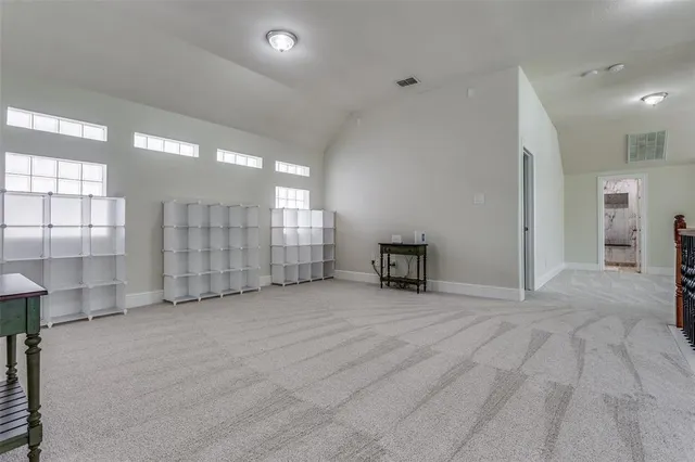 a large bathroom with a glass door shower