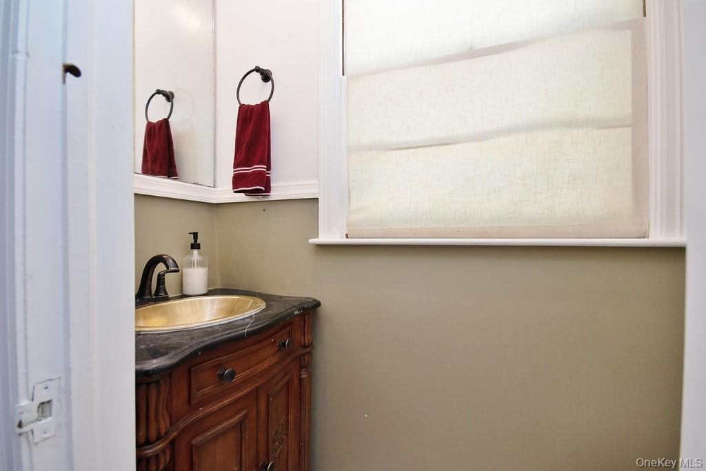 1 Noel Drive Ossining, NY 10562 - Photo 14 of 33 a kitchen with a sink and a mirror