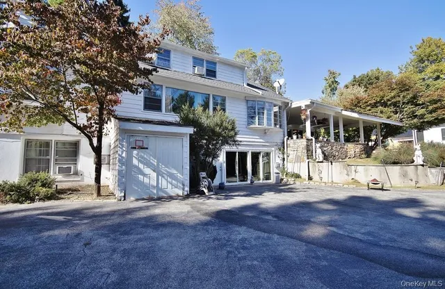 front view of a house with a street