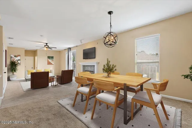 a view of a dining room with furniture