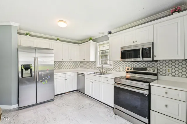 $330,000 | 2636 Scattered Oak Court, Raleigh, NC 27603