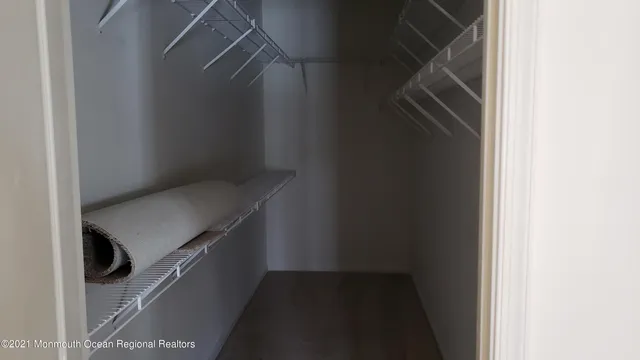 a bathroom with a sink a mirror and a shower