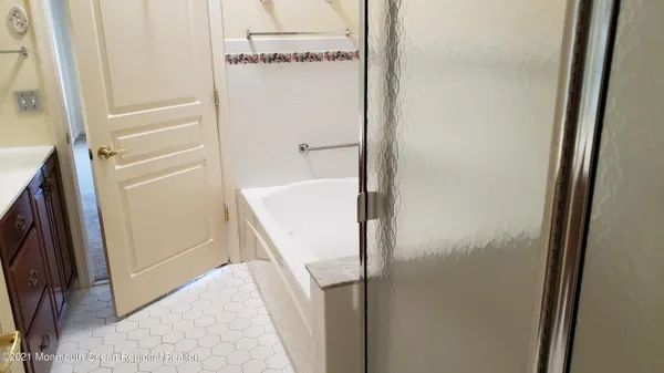 a bathroom with a toilet and a vanity
