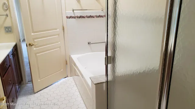 a bathroom with a toilet and a vanity