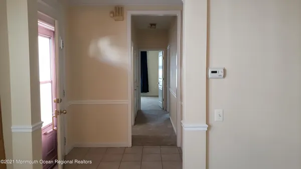a view of a hallway with painted walls
