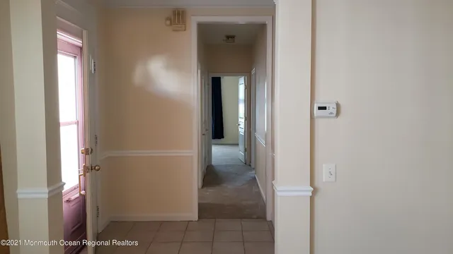 a view of a hallway with painted walls