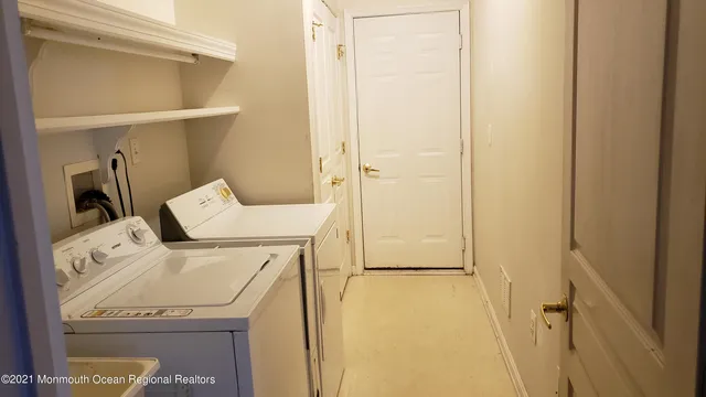 a kitchen with stainless steel appliances a sink and cabinets