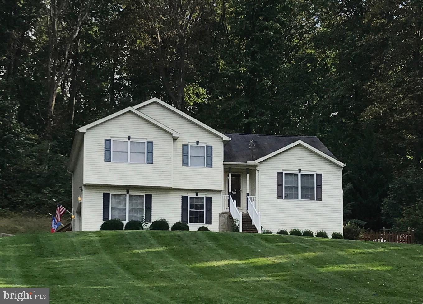 4253 Rinehart Road Westminster, MD 21158 - Photo 1 of 31 The pretty home is part of 3 private acres.