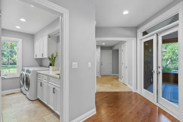 swimming pool view with a seating space