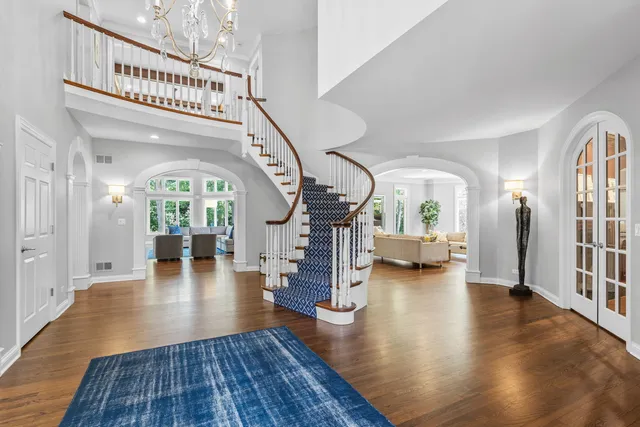 a view of entryway with wooden floor