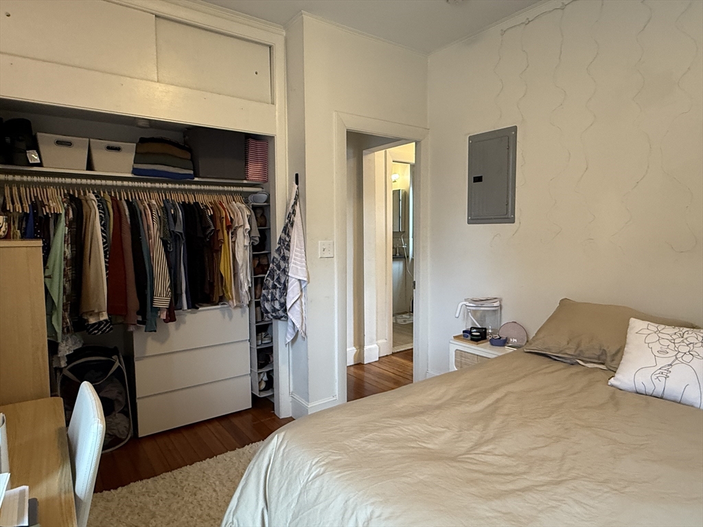 1871 Beacon Street, Unit 4 Brookline, MA 02445 - Photo 11 of 14 a bedroom with a bed and a view of bedroom