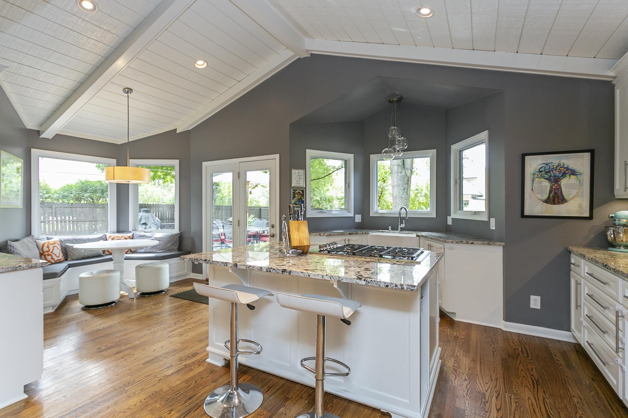 129 Laird Road Nashville, TN 37205 - Photo 1 of 27 Mid-Century Modern with vaulted ceilings provides this kitchen with lots of natural light.