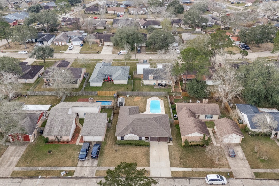16210 Tibet Road Friendswood, TX 77546 - Photo 27 of 27 an aerial view of residential houses with outdoor space